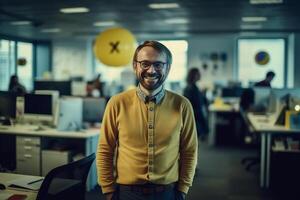 Portrait of smiling businessman standing with arms crossed in creative office. photo