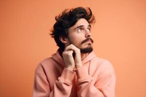 a Young man thinking an idea while looking up photo