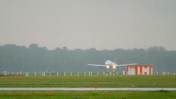 DUSSELDORF, GERMANY JULY 24, 2017 - Lufthansa Airbus 320 D AIPE braking after landing at rain. Dusseldorf airport, Germany video