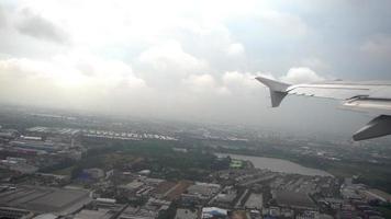 Airplane takes off during the rain from international airport, Bangkok, Thailand video