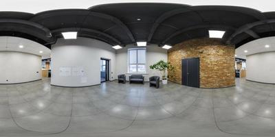 full seamless spherical hdri 360 panorama in interior empty square in hall of IT company among the corridors with brick columns with relax zone in loft style in equirectangular projection photo