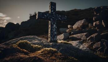 christian symbol on top of rock, cross symbol on the rock hill photo