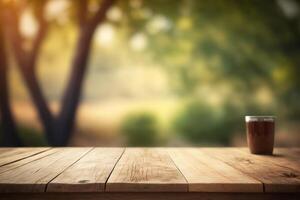 Empty wooden table in front for product display with blurred garden background. photo