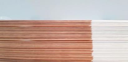 Close up pattern and line of Brown and white spine or saddle book are sorting and stacking for background with above space. Art group of object, Education and Library concept. photo