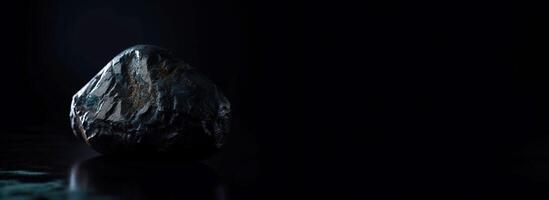 Pudretite is a rare precious natural stone on a black background. . Header banner mockup with space. photo