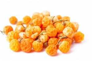 Fresh dessert cloudberry, isolate on white background. Macro studio shot. . photo