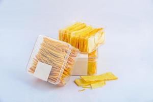 The snack cracker butter in the transparent box. photo