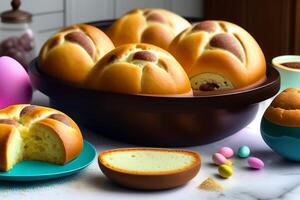 Bread rolls with raisins, raisins and chocolate eggs. photo