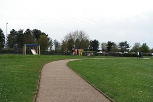 Beautiful Low Angle View of Caldecotte Lake Park and Pub with Restaurant. The Image Was Captured on 09-April-2023 During Cloudy Sunset with Cold Weather and Winds. photo