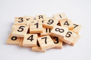 Number wood block cubes for learning Mathematic, education math concept. photo