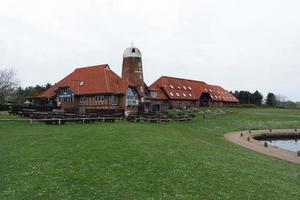 Beautiful Low Angle View of Caldecotte Lake Park and Pub with Restaurant. The Image Was Captured on 09-April-2023 During Cloudy Sunset with Cold Weather and Winds. photo