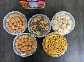 A various snacks of pastries served on the table at the celebration of Eid al-Fitr in Indonesia photo