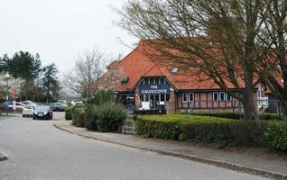 Beautiful Low Angle View of Caldecotte Lake Park and Pub with Restaurant. The Image Was Captured on 09-April-2023 During Cloudy Sunset with Cold Weather and Winds. photo