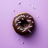 Chocolate donut on colorful background. Top view, flatlay photo