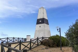 Landscape with geodesic mark in Aljustrel, Portugal photo