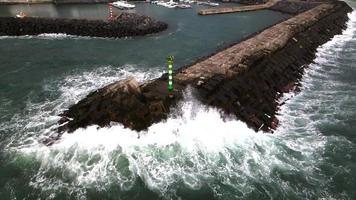 Waves at Povoacao Pier in Sao Miguel in the Azores by Drone video