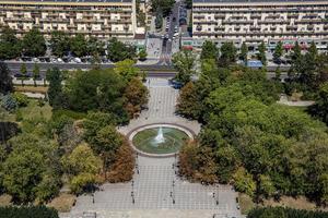 landscape of the city of Warsaw from the vantage point in the Palace of Culture on a warm summer sunny day photo