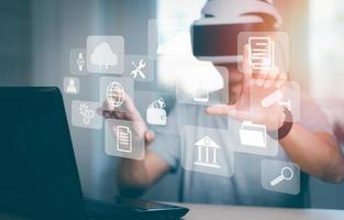 Man wearing VR glasses virtual touchscreen on the graph Screen Icon of a media screen, Technology Process System Business with Communication and marketing concept, big data, HR Human, Business success photo