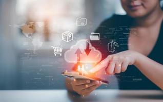 Woman touch smartphone connect to data information on the Cloud Computing Technology Internet Storage Network Concept And a large database big data Through internet technology, Cloud sharing download photo