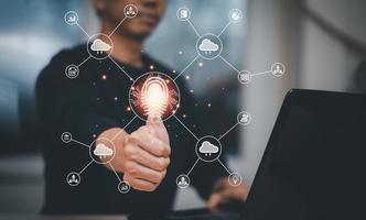 Man touching fingerprint of Cloud networking concept, touch screen with hand connection line on the White background, Cloud computing is system for sharing download and upload big data information photo