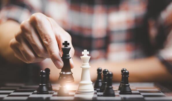 Planning and Decision concept, Businessman with strategy competitive ideas concept with chess board game. Business competition, Fighting and confronting problems, threats from surrounding problems. photo