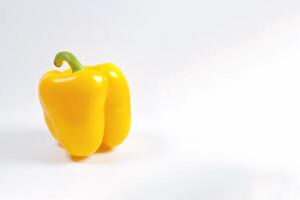 yellow bell pepper isolated on white background with copy space. photo