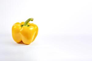 yellow bell pepper isolated on white background with copy space. photo