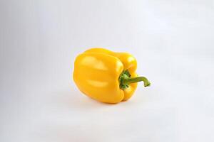 yellow bell pepper isolated on white background. photo