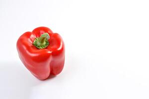 red bell pepper isolated on white background with copy space. photo