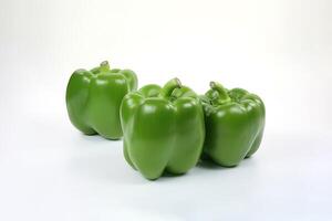 a group of green bell pepper isolated on white background. photo