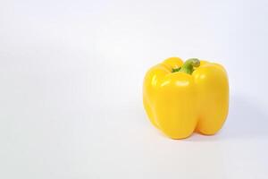 yellow bell pepper isolated on white background with copy space. photo