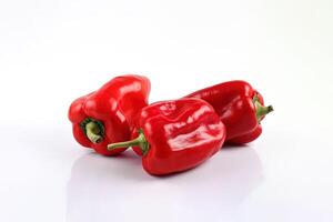 a group of red bell pepper isolated on white background. photo