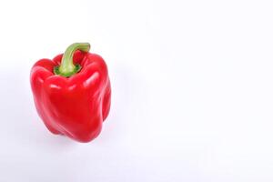 red bell pepper isolated on white background with copy space. photo