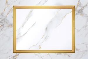 Rectangle gold frame on white marble background. photo