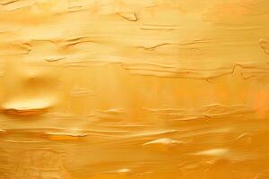 Golden paint texture background. photo