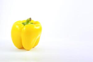 yellow bell pepper isolated on white background with copy space. photo