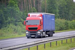 Truck Driving on Road - Front View photo