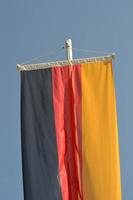 Material Flag of Germany and Sky in Background photo