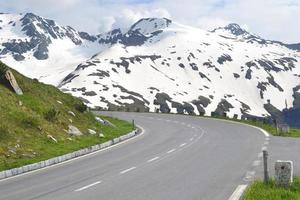Road in Alps Mountains in Summer, Snow on Peaks photo