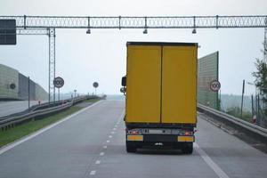 Truck Driving on Highway - Back View photo