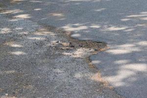 Big Pothole in two Kinds of Asphalt photo