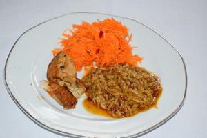 Meat with Flavoured Rice and Carrots Salad photo