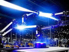 Modern High Tech Industrial Robotic arm on the factory production line production line is being welded. . photo