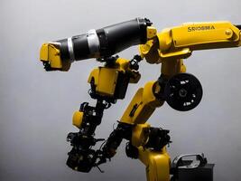 Modern High Tech Industrial Robotic arm on the factory production line production line is being welded. . photo