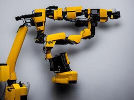 Modern High Tech Industrial Robotic arm on the factory production line production line is being welded. . photo