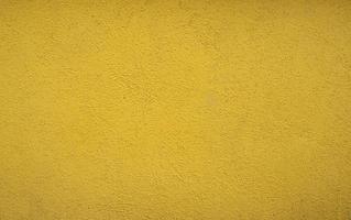 yellow plaster wall background photo