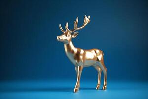 Golden reindeer isolated on blue background Christmas concept Christmas holiday photo