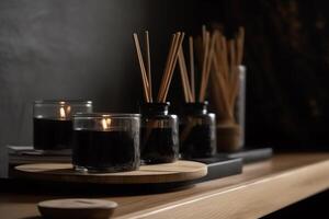 A Mockup Of Aromatherapy Black Scented Candles With Aroma Reed Diffuser Displayed On A Wooden Shelf photo