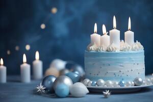 Blue Background With White Cake And Candles photo
