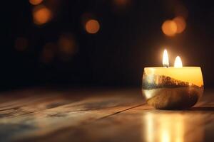 Blurred Background With Golden Candle And Wooden Table photo